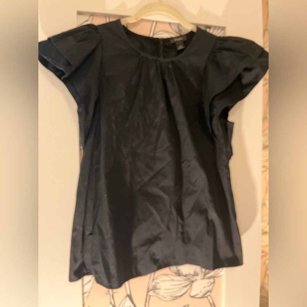 Ruffled sleeveless top